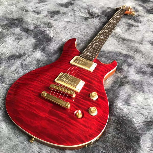 

custom grand flamed maple electric guitar in red with gold tuner bridge