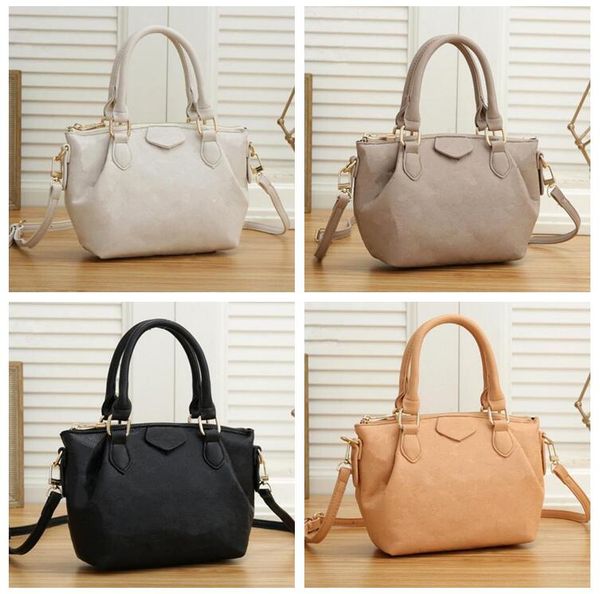 

onthego mm pm gm totes bags caramel wild at heart embossed leather luxurys designers bags leopard print business shopping handbags on the 10