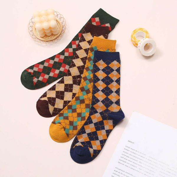 

it is made of generous lattice combed cotton medium tube socks, women's autumn and winter tide brand double needle stockings, pure, Black;white