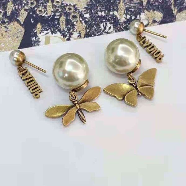 

factory specials new fire bee asymmetric women brass earrings version wkn5, Golden