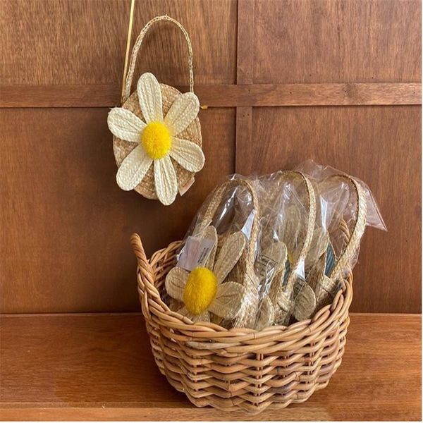 

backpacks 2021 south korea's same ins wind daisy flower bag straw hand-woven children's hand cute girl