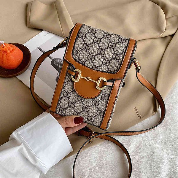 

2022 latest luggage factory wholesale red texture mini square summer mobile phone color contrast women's leisure simple vertical bags