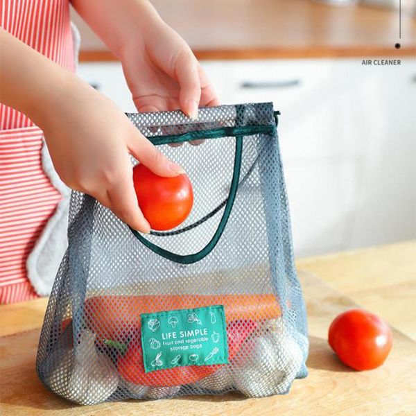 

portable hand-held hollow breathable hanging bag household storage kitchen fruit and vegetable mesh bags