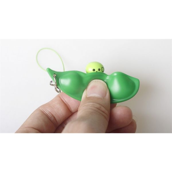 

squeeze vent toy squeeze music expression decompression pea pod keychain1