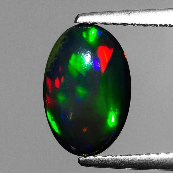 

beautiful 0.65 ct natural ethiopia black 5x7 opal oval cabochon loose gemstone h1015
