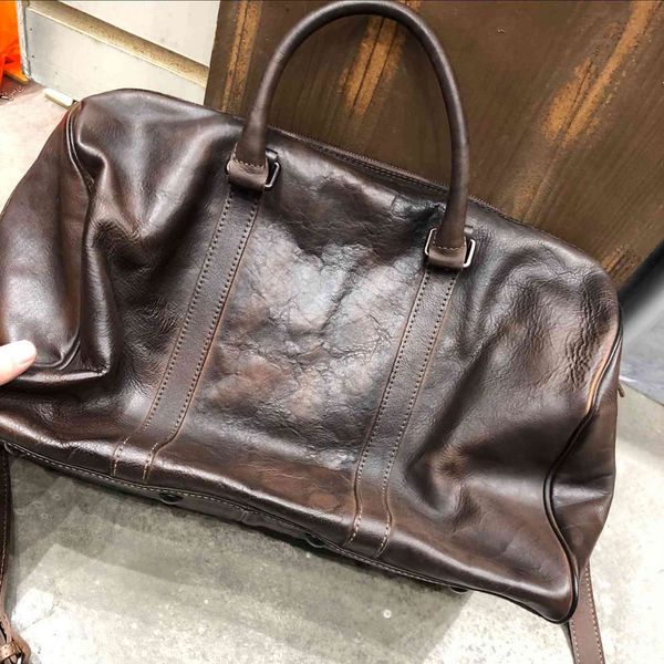 

leather handmade head leather men's and women's handbag travel shoulder bag