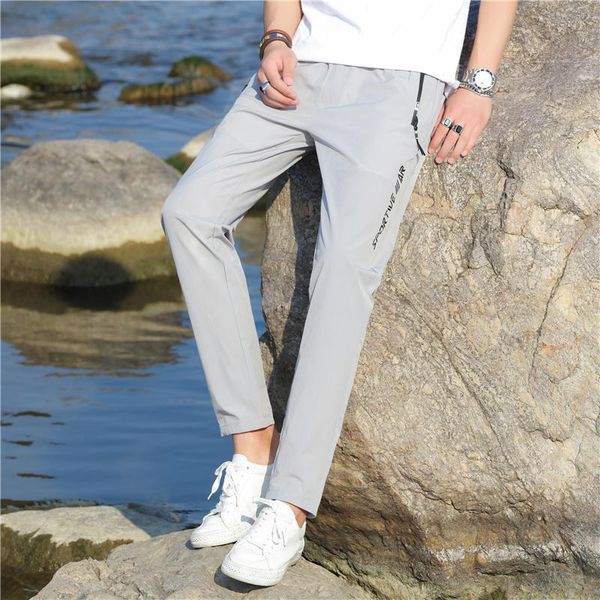 

men's pants casual slim fit small feet korean fashion ice silk thin summer solid color printing simple nine point trousers boy, Black