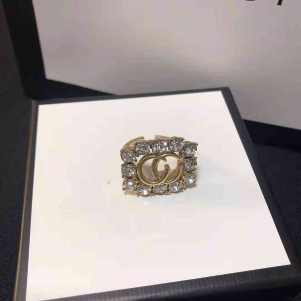 

70% off / gujiafeng net red simple gold old inlaid zircon letter women's hollow out ring qypm, Silver