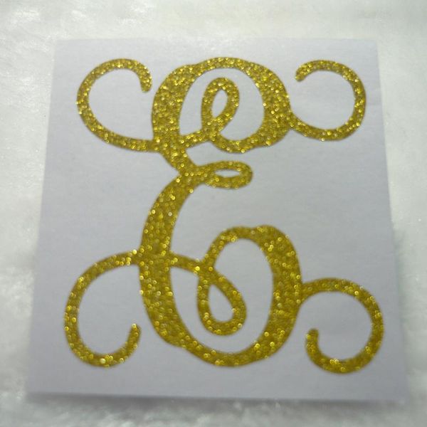 

multi size gold glitter sticker of letter e gift wrap