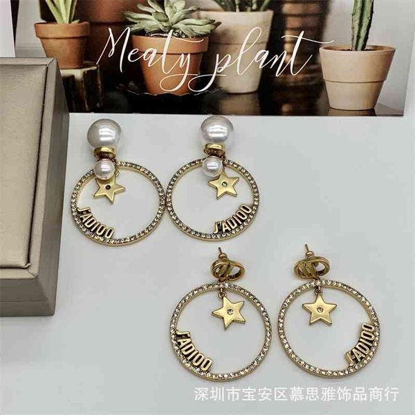 

2021 new designer years family pearl earrings letter s925 silver needle anti allergy version, Golden