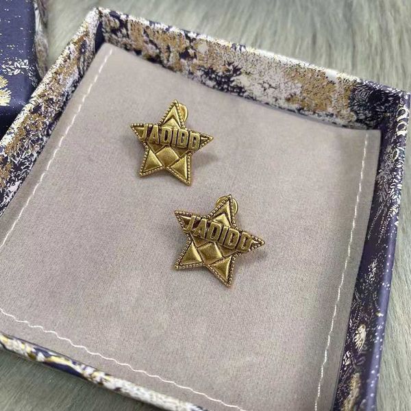 

in 2021, d family five pointed star letter earrings, brass fashion earrings and female 925 sier needles, Golden