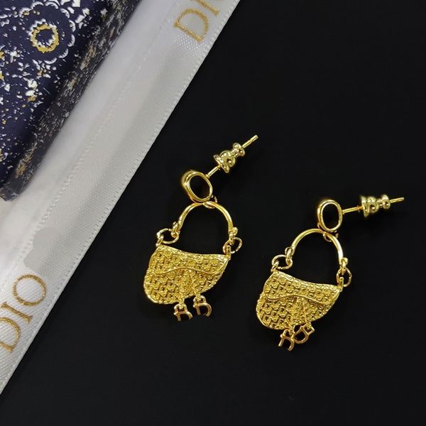 

75%off outlet onlineoriginal standard zhonggu s925 silver needle new style personalized saddle bag earrings, Golden