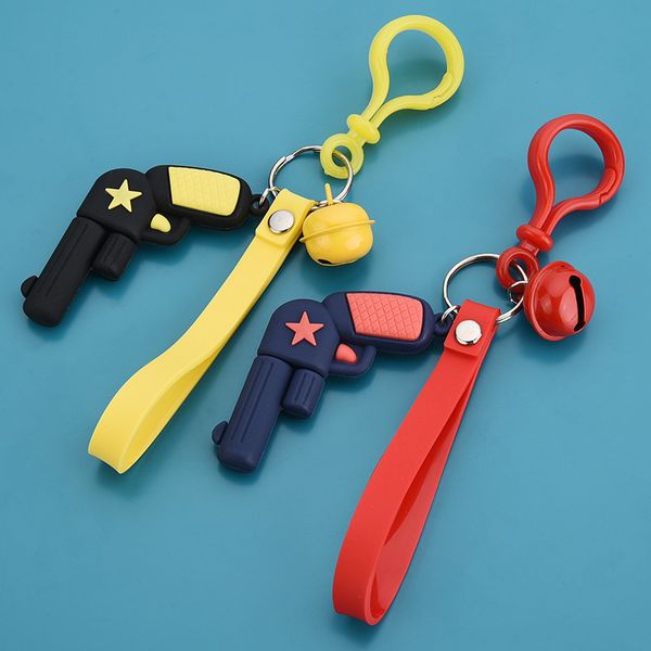 

2021 fashion keychain pvc soft plastic imitation pistol key chain cartoon jedi eat chicken bell pendant bag decoration festival gift, Silver