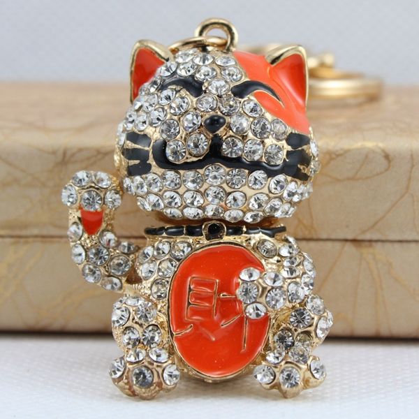 

zhaocai metal craft 0rhine-stone key chain cartoon ball holding cat car bag pendant 10 yuan store, Slivery;golden