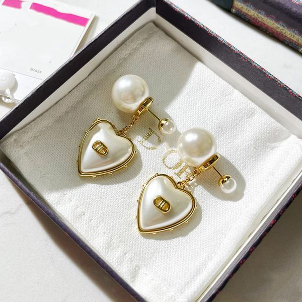 

charms 's golden love letter cd pearl two peach heart earrings fashion temperament heavy industry earrings