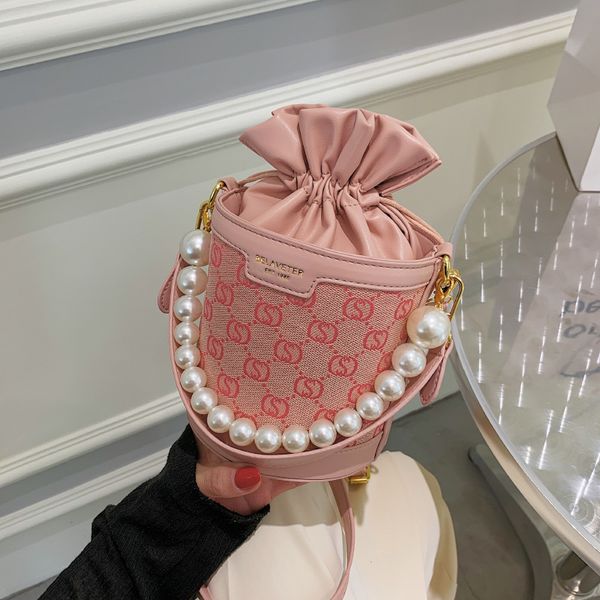

design handbag candy bag women's 2021 new pearl portable small round korean version ins fashionable letter shoulder