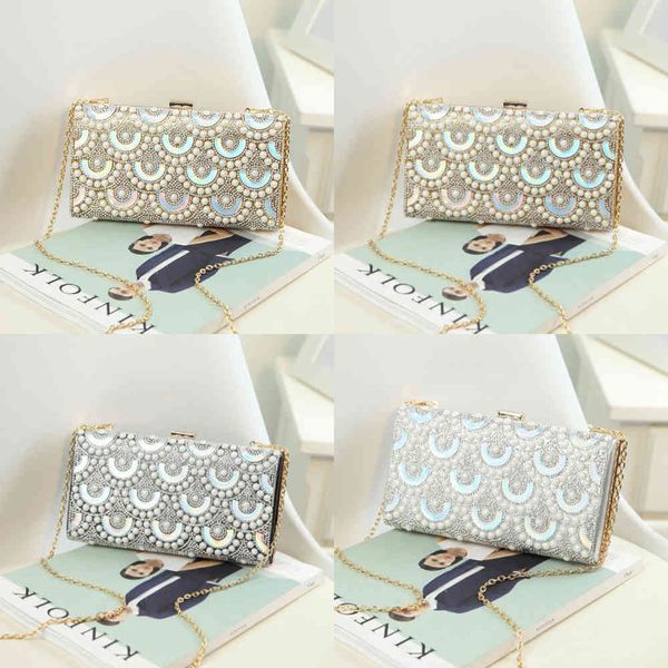 

2021 new hand holding women's pearl diamond dinner bag geometric pattern one shoulder slanting chain small square bag tide, Black;red