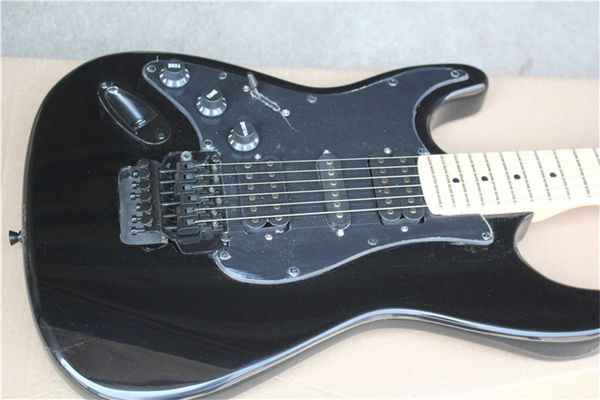 

6 strings black left handed electric guitar with tremolo bar,maple fretboard