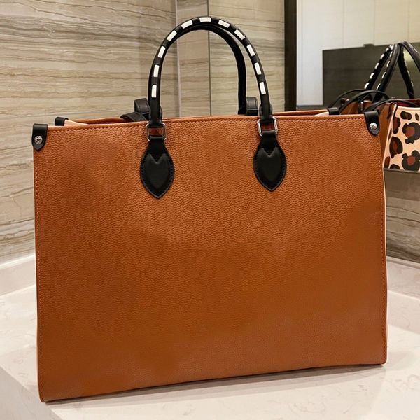 

large handbag tote shopping bag embossed letters mid length shoulder strap high-capacity package