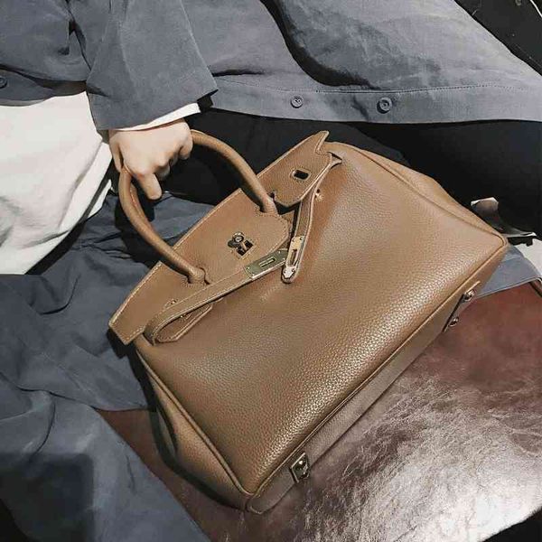 

2021 new fashion women's hand versatile big single shoulder messenger bag trend