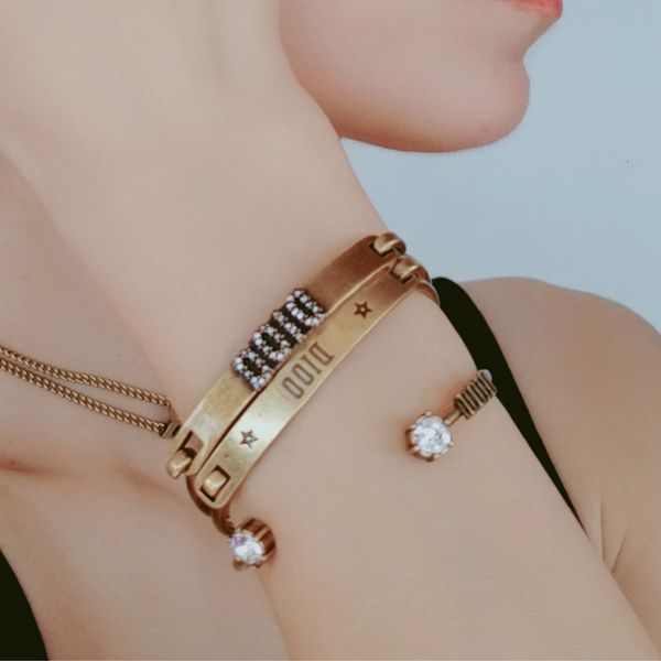 

d family brass letter three piece set bracelet, Golden;silver