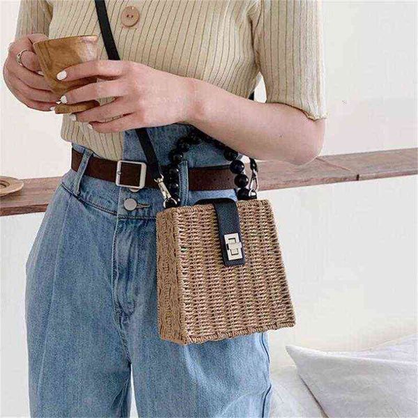 

hbp non-brand cute wooden bead hand summer beach forest series metal lock one shoulder straw woven bag sport.0018