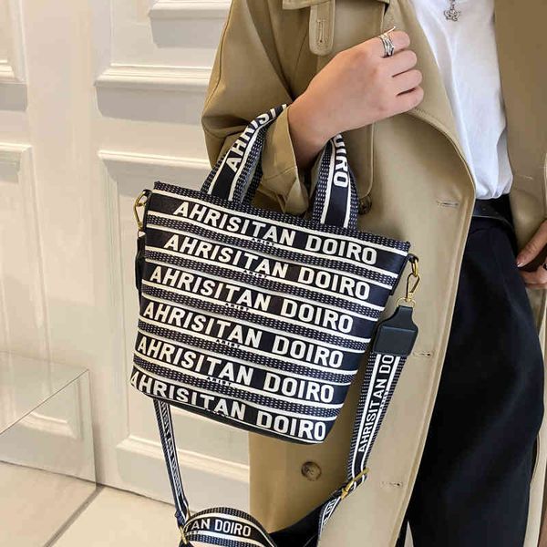 

backpack small bag women's messenger 2021 korean trendy suspender letter one shoulder tote canvas handbag s, Black;red