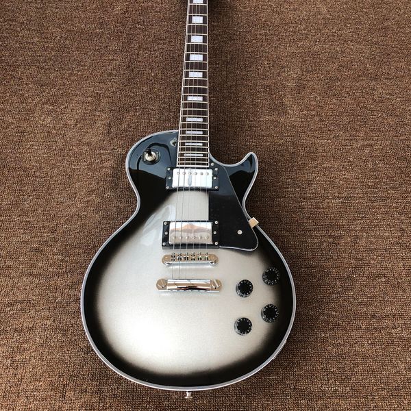 

electric guitar,rosewood fingerboard,chrome hardware,silver colors