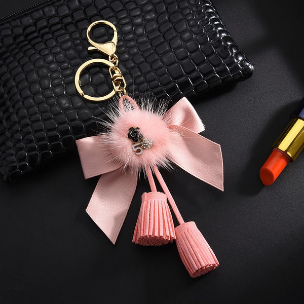 

2021 fashion keychain fashion korean velvet 5-word bow key chain mink fur ball tassel pendant, Silver