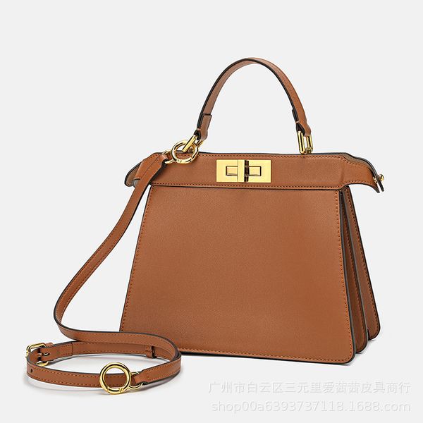 

2021 new yujie leather revolving buckle kitten cowhide women's messenger portable shoulder bag