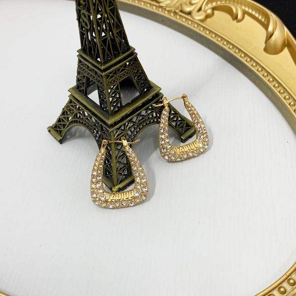 

2021 new designer family's full diamond earrings in 2021, Golden