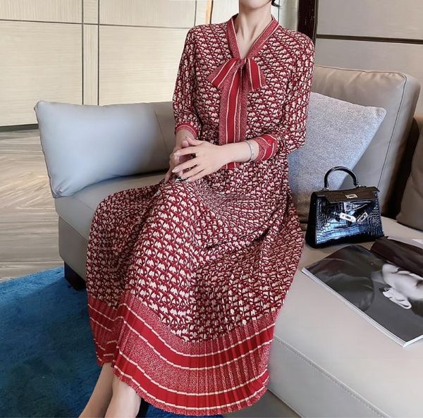 

two piece dress printed d family with heavy pleated neckline tie, White