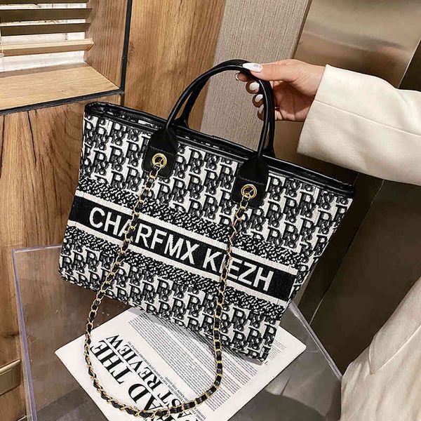 

large capacity bag female line letter versatile portable shoulder net red tote male outlets hand outlets