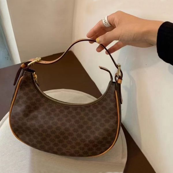 

women luxurys designers bags 2021 lisa's same underarm female flower half moon one hand-held cowh designer handbag handbags totes cross