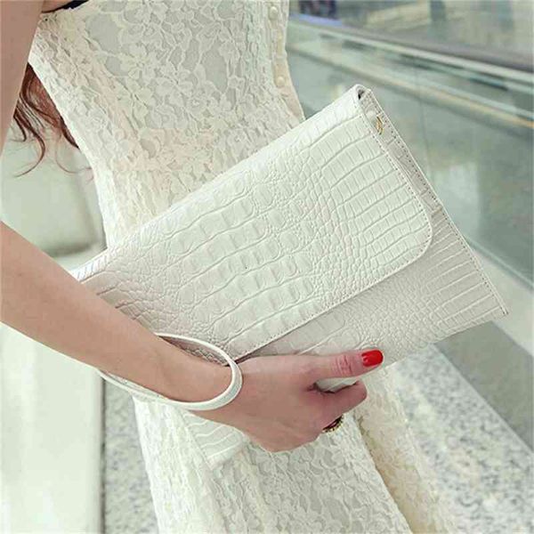 

leather envelope lady hand crocodile dinner bag delivery