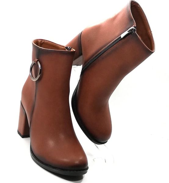 

boots very chic office and everyday use brown black fashion latest trend bo0t.  cm heel height quality. thick