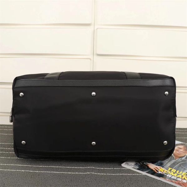 

2021 new nylon black large-capacity luggage waterproof handbag mens travel bag mmm