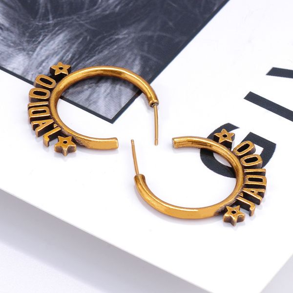 

2021 luxury designer jewelry star letter earrings feminine temperament female 925 silver needle advanced star net red same