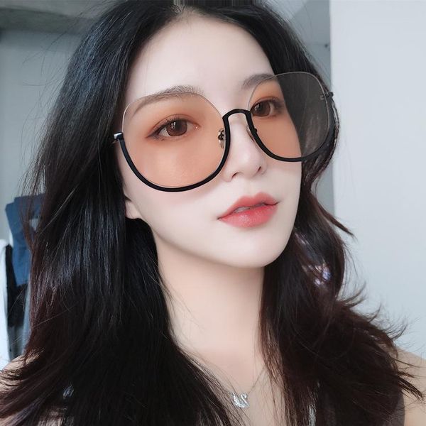 

sunglasses metal box big sunglasses. it's light brown, White;black