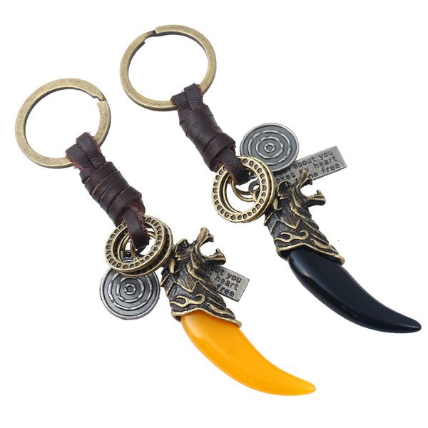

key rings woven cowhide chain real pendant resin wolf tooth bag, Slivery;golden