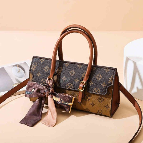 

2022 factory wholesale new dragonfly leisure texture foreign style printed autumn and winter korean version single shoulder messenger portab