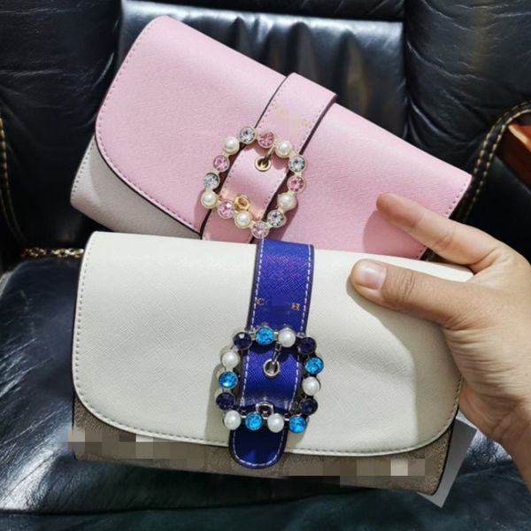 

luxury design handbag 2021 new fashion chain women's fresh color matching pearl buckle one shoulder messenger bag hand wrist bag c1484
