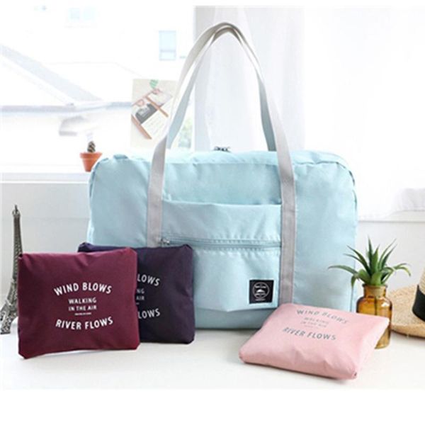 

storage bags fashion foldable travel large capacity bag luggage women waterproof handbags men home organizer