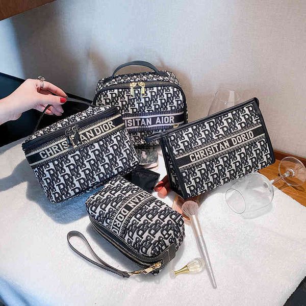 

2022 latest models handbag wholesale direct korean large capacity portable travel portable storage canvas embroidery wash