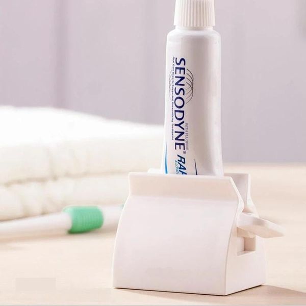

toothbrush holders fashion creative facial cleanser extruder foreign trade explosion plastic bathroom daily necessities manual toothpaste