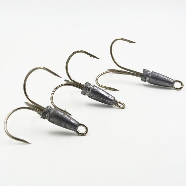 

fishing tackle three anchor hooks with lead sinker white brown fish hook