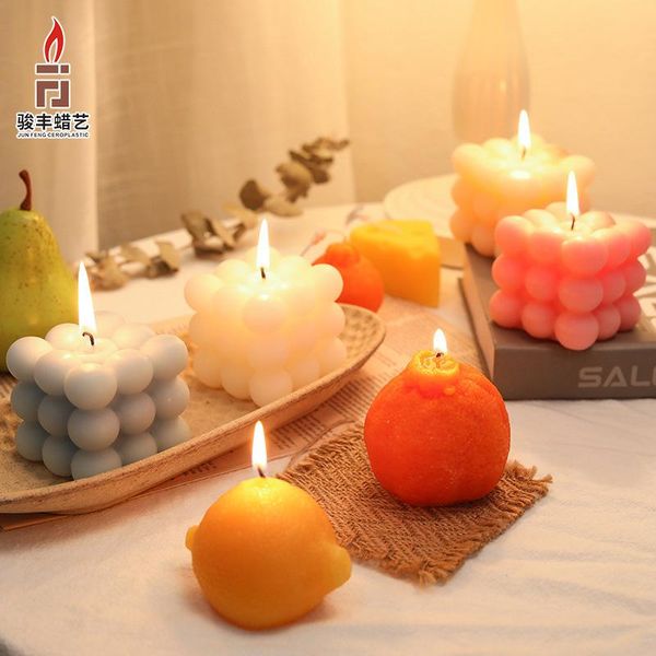 

korean version of ins soy wax scented candle, home decoration po props ugly orange with souvenir cheese candle candles