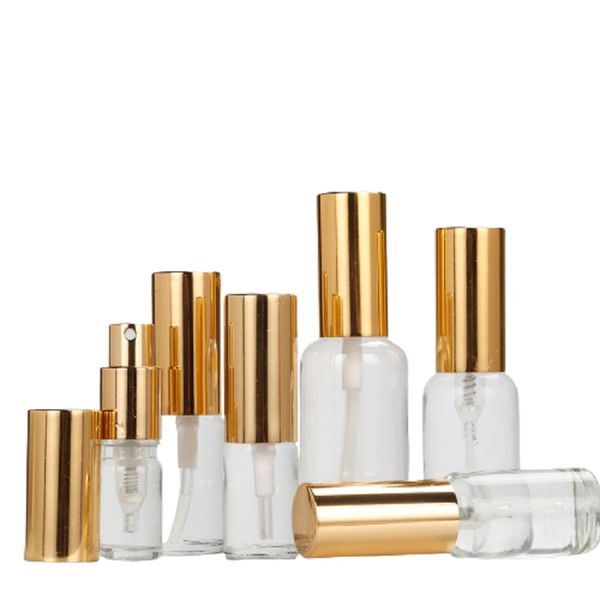 Bottiglia di vetro trasparente Imballaggio in oro lucido Lozione spray Pompa per pressa Emulsione di essenza vuota Fiale ricaricabili Contenitore cosmetico per profumo 5ml 10ml 15ml 20ml 30ml 50ml 100ml