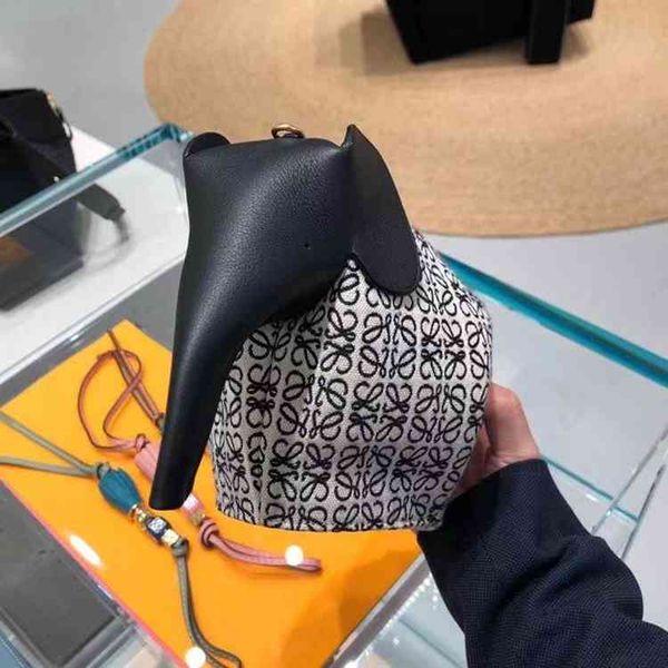 

handbag hookloewe / luo yiwei 21 spring and summer elephant old canvas splicing leather tote women's bag oeinluggage tag