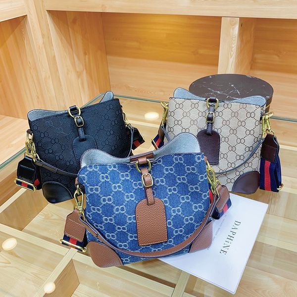 

outlet online 70% off sale this year's fashion is new in the autumn of one shoulder diagonal span denim contrast color bucket bag high-